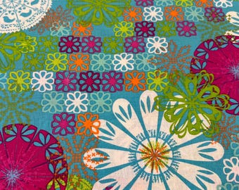Floral and Geometric Pattern Features Bright Multi-Colored Designs in Shades of Green, Blue, Pink, Purple, and Orange. Cotton Sold BTY