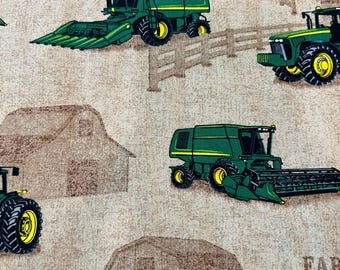 John Deere Farm Country Featuring Repeating Scenic of Green Tractors, Combines, and Barns on a Brown/Tan  Background. Cotton by the Remnant.