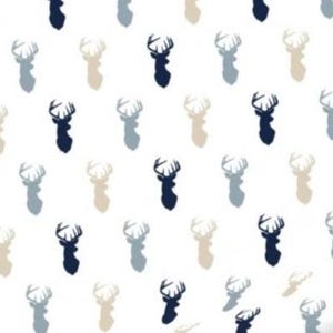 May include: White background with a repeating pattern of deer head silhouettes in navy blue, light blue, and beige. The deer heads are evenly spaced and create a symmetrical design.