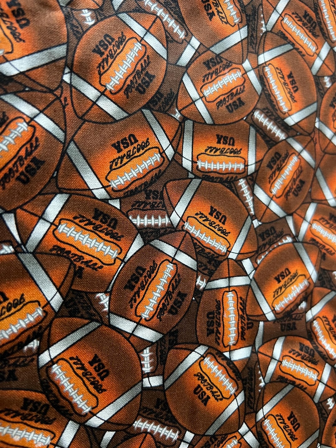 Footballs NFL With a Repeating Pattern and a Text 