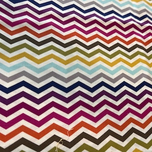 May include: A set of three ceramic mugs with a speckled, matte finish. The mugs are in shades of cream, light gray, and dark gray. Each mug has a simple, minimalist design, perfect for coffee or tea.