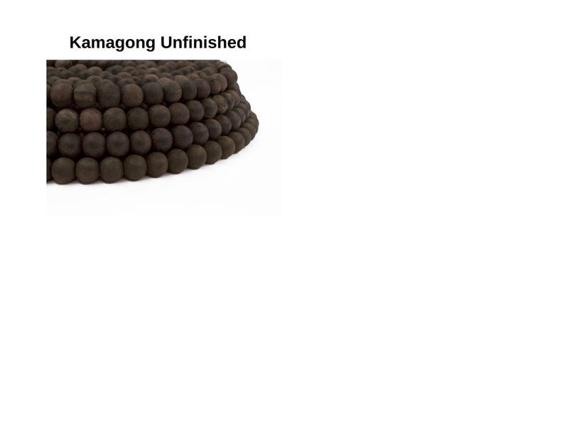 May include: A strand of dark brown wooden beads, unfinished and ready for crafting projects.