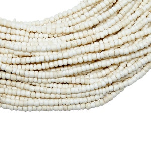 2-3mm White Coconut Shell Pucalet Rondelle Beads - Bleached - 15 inch strand