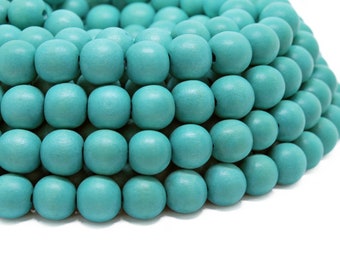 10mm Turquoise Round Wood Beads - Dyed and Waxed - 15 inch strand