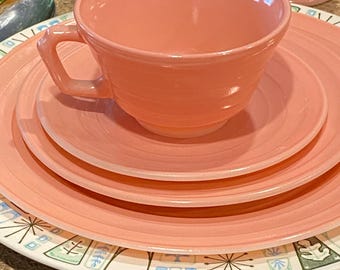 Hazel Atlas Moderntone Platonite dinnerware in pastel pink. 1940’s