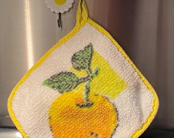 Vintage Terry cloth Potholder and a set of fridge magnets