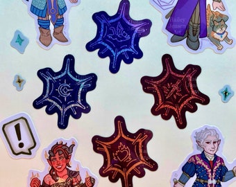May include: A collection of fantasy-themed stickers featuring various characters and designs. The stickers include illustrations of people, a cat, and geometric shapes with holographic accents. The artist's name, "Hailey Jensen Art," is visible on some stickers.