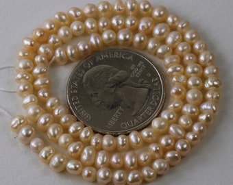 Perlas de agua dulce perlas ligeramente ovaladas perlas de arroz perlas de patata, 1/4, 1/2, o Full Strand 4mmx 4.7mm Pastel Blush Peach Bridal Boda KJ