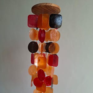 windchimes orange red black round capiz shell - sounds relaxing - beach decor