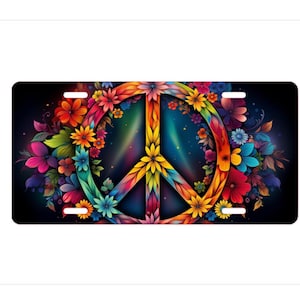May include: A colorful peace sign surrounded by a wreath of vibrant flowers on a dark background.