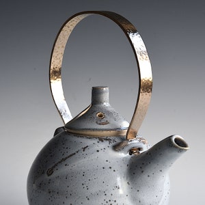 Small teapot with brass handle image 1