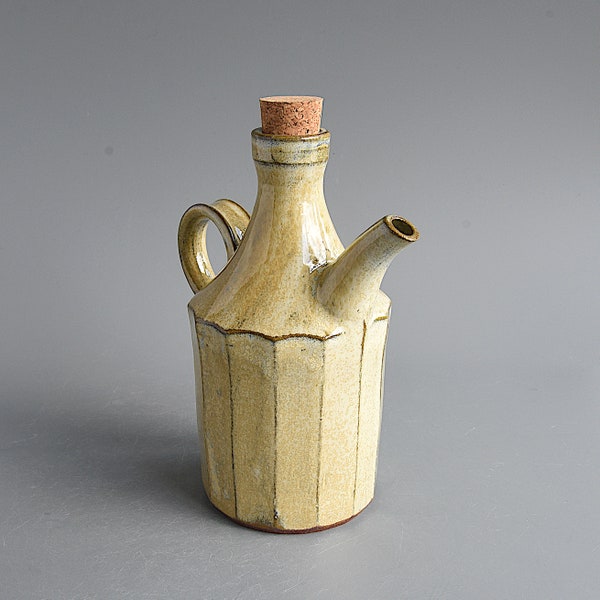 Oil/vinegar bottle  with facets and special glaze
