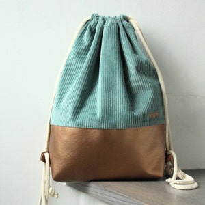 From 39.90 euros corduroy gym bag dusty green imitation leather copper gold festival bag image 1