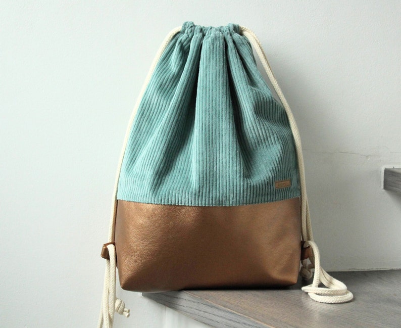 From 39.90 euros corduroy gym bag dusty green imitation leather copper gold festival bag image 1