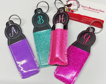 Personalized embroidered glitter, cow print, leopard print chapstick holders, bag tag, key fob