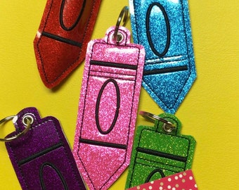 Embroidered glitter, crayon lip balm holder, key fob, bag tag
