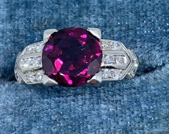 Art Deco platinum and diamond solitaire ring, natural purple sapphire, fishtail prong setting, size 6.25