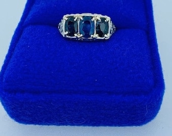 Three carat Art Deco 18k filigree oval sapphire three stone ring, diamond shoulders, floral filigree pattern, size 5