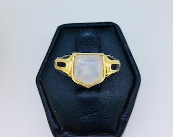 Victorian memorial ring, 18k yellow gold, black enamel, and a chalcedony shield, inscribed 1854-1886 in memory of Mary Hadley, size 7 1/2