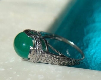 Platinum, diamond, and emerald calibre and oval cabochon ring, NSEW, glowy and beautiful!  Art Deco, size 7