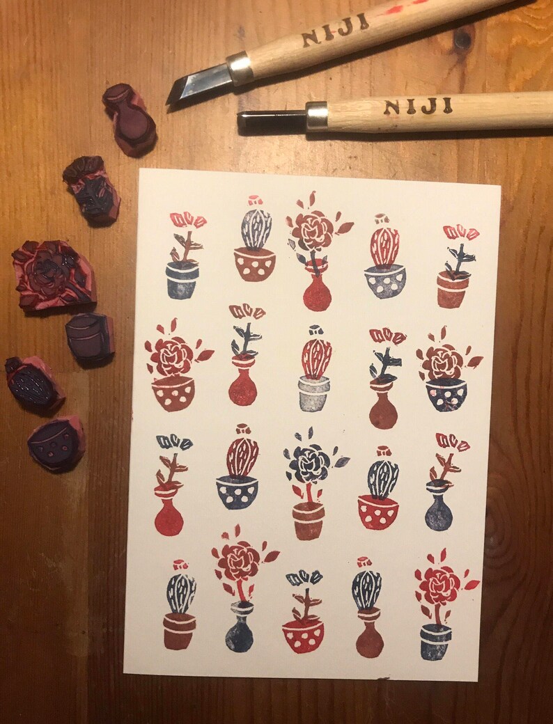Handprinted card with potted flowers and cactus