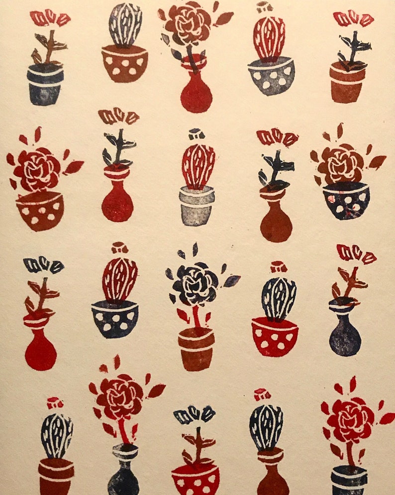 Handprinted card with potted flowers and cactus