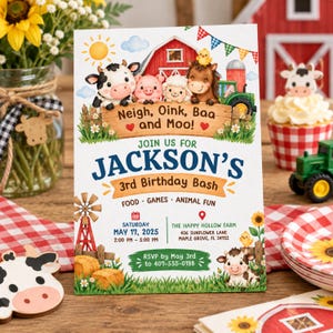 May include: A rectangular birthday invitation card featuring a red barn, a green tractor, and cartoon farm animals including a cow, pig, sheep, and horse. The text reads: Neigh, Oink, Baa and Moo! JOIN US FOR JACKSON'S 3rd Birthday Bash on May 17, 2025.