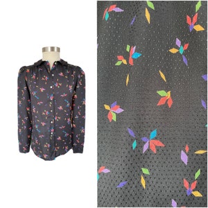 1980s jazzy patterned black button up blouse // eighties style abstract pinwheels // rainbow bursts on textured black shirt // medium