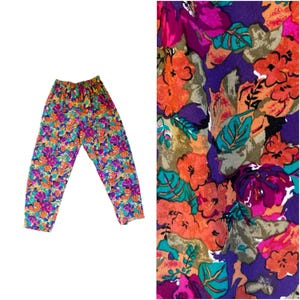 May include: A pair of colorful floral print pants with a wide leg and elastic waistband.