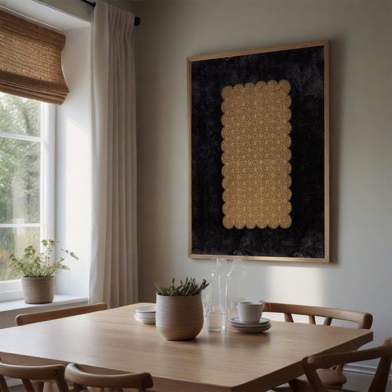 A dining area featuring an oversized printable wall art piece with a golden lace design on a black backdrop, framed elegantly. The artwork adds a sophisticated touch to the room, enhancing the overall decor. Perfect for instant download to elevate any interior space.