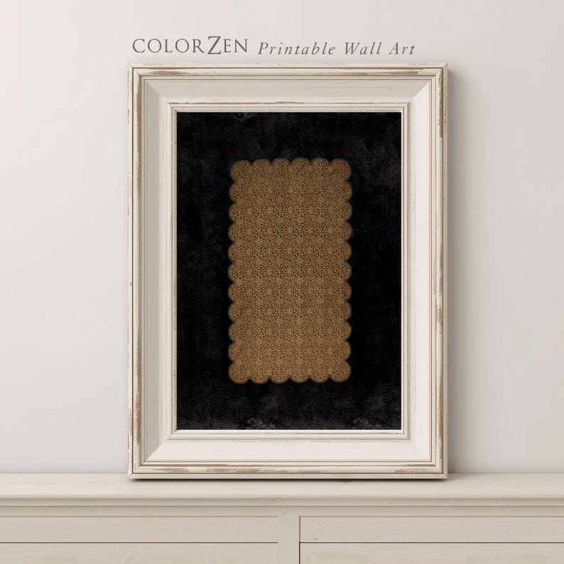A beautifully framed printable wall art piece showcasing intricate golden lace against a black background. The vintage-style white frame complements the design, making it a stunning addition to any home decor. Instant download available for effortless decorating.