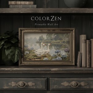 Detailed shot of blue cottagecore floral art print. Calm river backdrop with white geese. Rich oil paint texture ideal for a farmhouse kitchen or cozy entryway gallery wall, light or dark.
