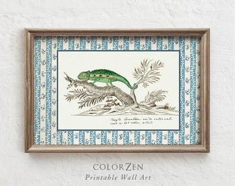 May include: A framed print of a green chameleon on a tree branch, with a blue and white striped border and a wooden frame. The text "COLORZEN Printable Wall Art" is displayed at the bottom of the image.