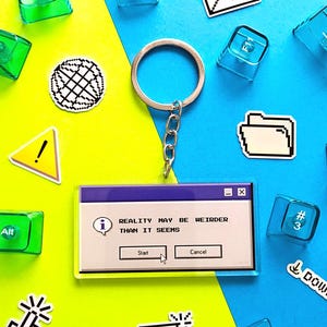 May include: A white ceramic mug with a black handle and the text "But First, Coffee" in a black, bold font. The mug is sitting on a wooden surface.