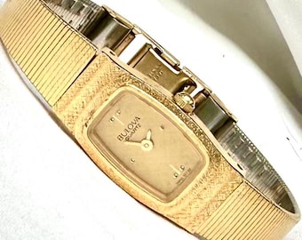 Reloj de pulsera vintage Bulova suizo de tono dorado para mujer, en perfecto estado de funcionamiento, con batería nueva. ¡Impecable!