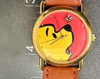 Vintage to Modern Winnie the Pooh Teaches TIME Watch in English
