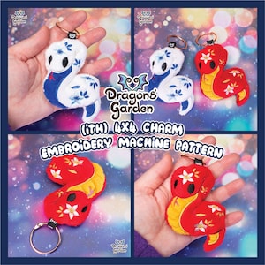 May include: Two embroidered snake charms, one blue and white with floral designs, the other red and yellow with white flowers. Both charms are attached to key rings. The charms are labelled "(iTH) 4x4 CHARM EMBROIDERY MACHINE PATTERN".