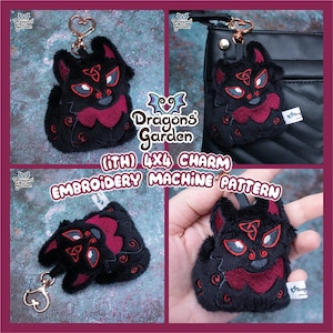 May include: A black and red plush charm with a Celtic knot design, attached to a gold key chain. The charm is 4x4 inches and is designed for embroidery machines. The charm is labeled "Dragons Garden".