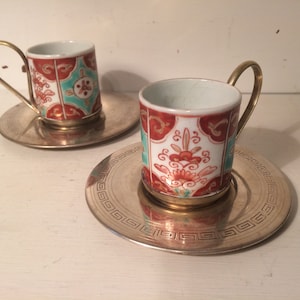 Pair of Chinese Demitasse Cups with Silver Plated Saucers