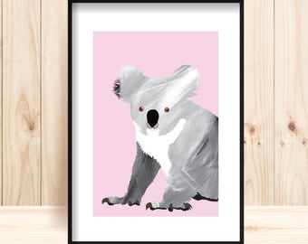 May include: A gray and white koala bear with brown eyes is sitting on a pink background. The koala is facing the viewer and has a friendly expression.