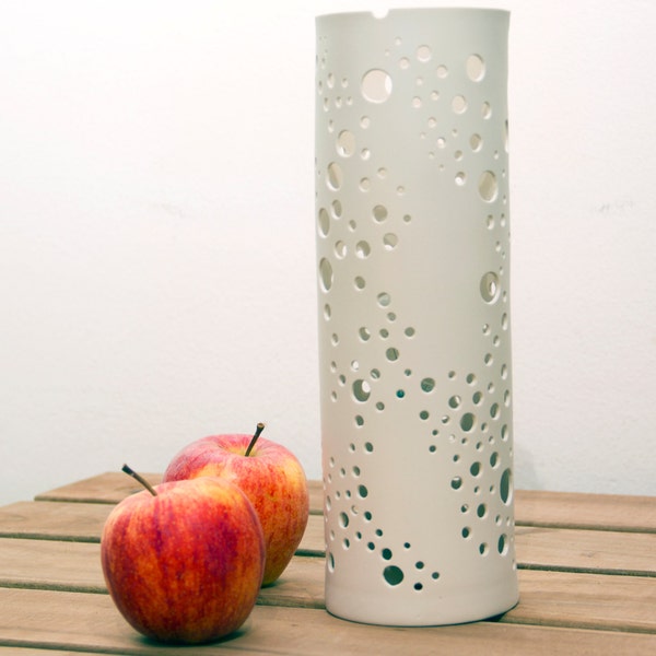 Porcelain cylinder with holes