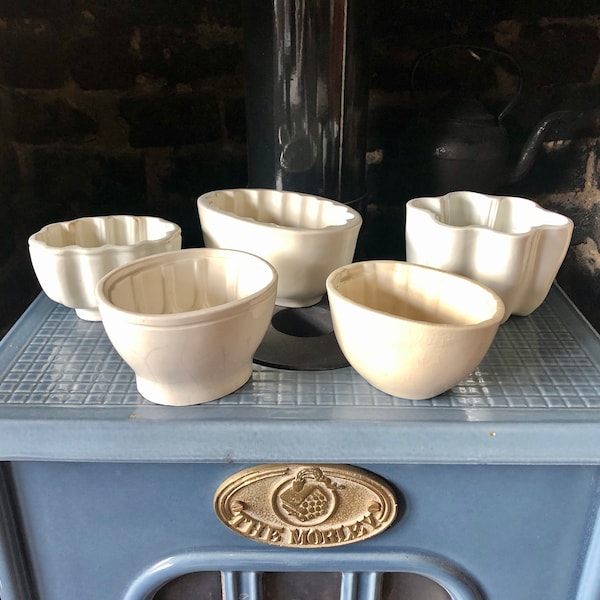 Five vintage ceramic jelly moulds