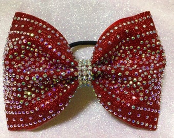 Tailless rhinestone bow on red glitter