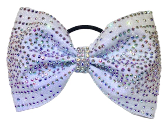 Tailless rhinestone bow on white glitter