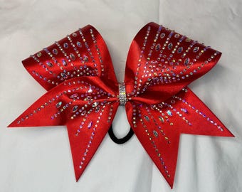 Lazo de animadora de satén rojo con pedrería