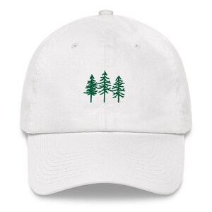 May include: White baseball cap with an embroidered design of three green pine trees.