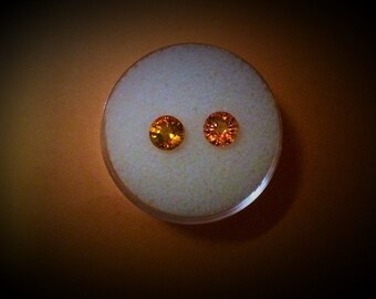 Pair of 5.5 mm round genuine yellow sapphires