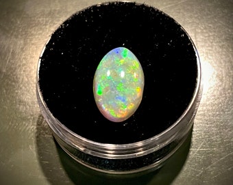 Australian opal: High quality natural oval opal with lots of color and flash