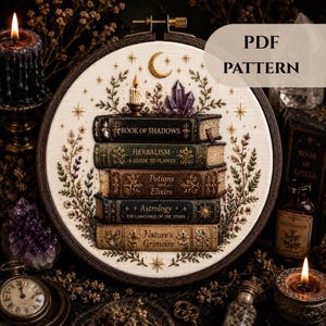 May include: An embroidery hoop containing a fabric panel with a stack of five books titled Book of Shadows, Herbalism, Potions and Elixirs, Astrology, and Nature's Grimoire. The design includes a crescent moon, stars, crystals, and foliage.
