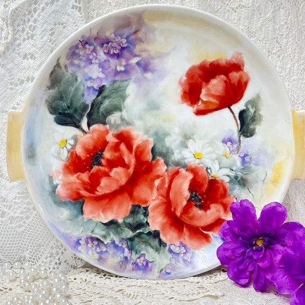hand painted made in Germany, porcelain plate, orange poppies, purple violets, and white daisies 10.5 in handles